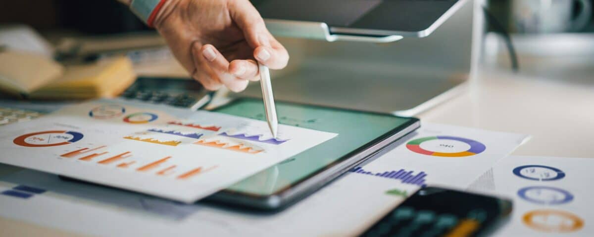 a person is writing on a piece of paper