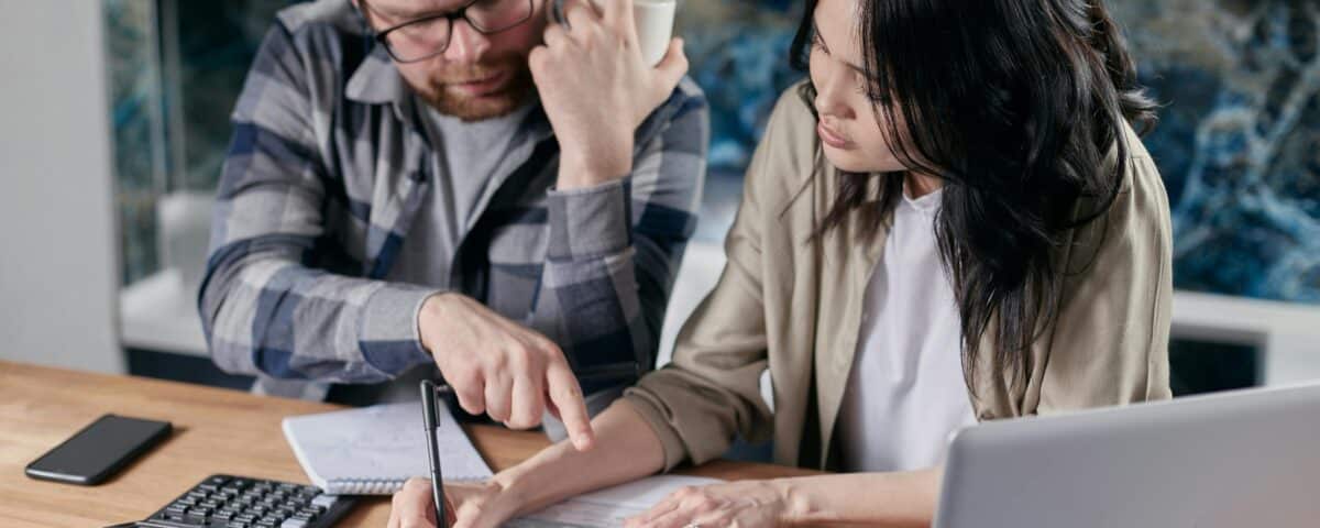 Free couple calculating al their bills stock photo