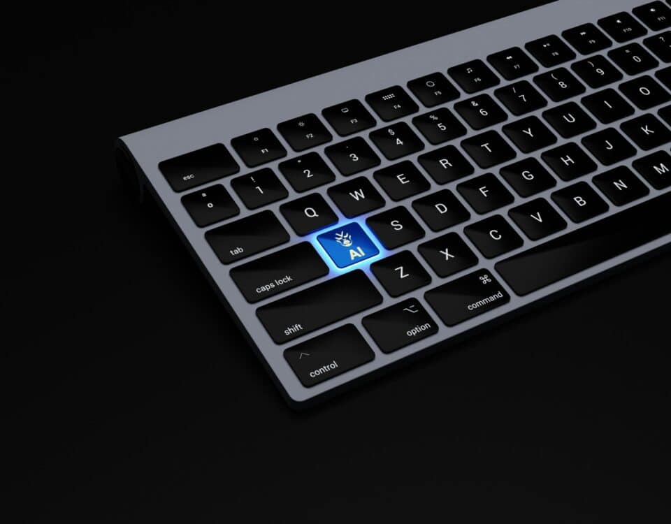 a black keyboard with a blue button on it